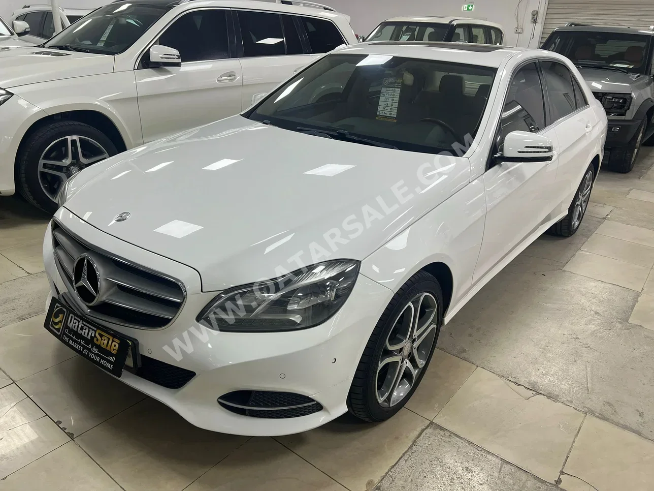 Mercedes-Benz  E-Class  200  2016  Automatic  82,000 Km  4 Cylinder  Rear Wheel Drive (RWD)  Sedan  White