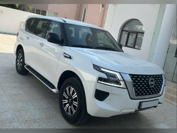 Nissan  Patrol  XE  2023  Automatic  34,000 Km  6 Cylinder  Four Wheel Drive (4WD)  SUV  White  With Warranty