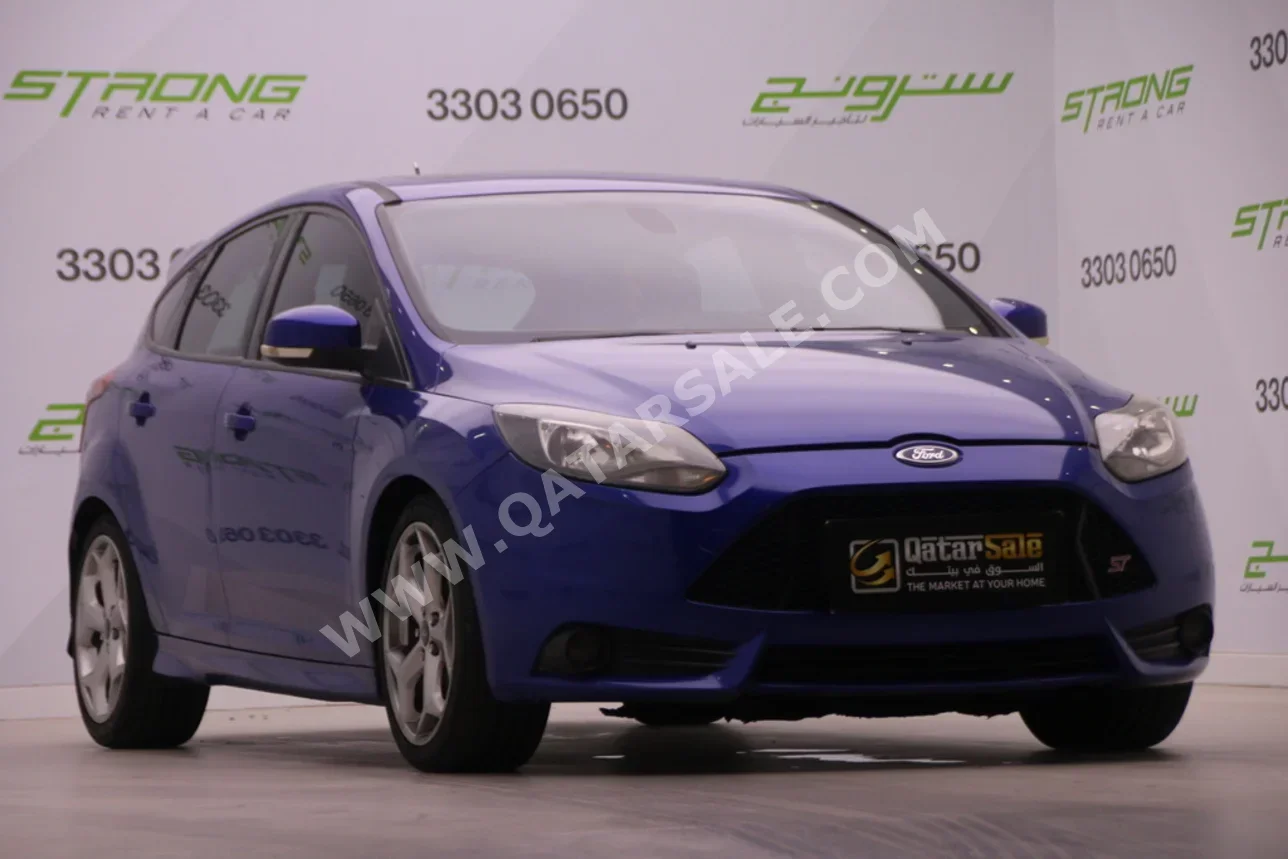 Ford  Focus  ST  2014  Manual  167,000 Km  4 Cylinder  Front Wheel Drive (FWD)  Hatchback  Blue