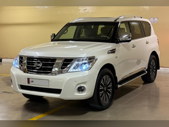 Nissan  Patrol  Platinum  2015  Automatic  143,000 Km  8 Cylinder  Four Wheel Drive (4WD)  SUV  White