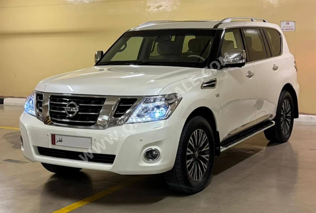 Nissan  Patrol  Platinum  2015  Automatic  143,000 Km  8 Cylinder  Four Wheel Drive (4WD)  SUV  White