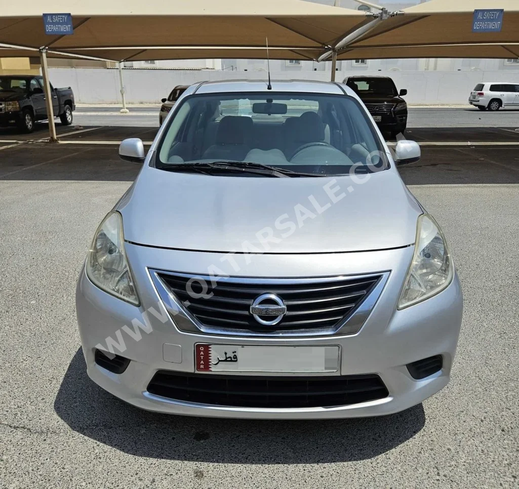 Nissan  Sunny  2014  Automatic  184,000 Km  4 Cylinder  Sedan  Silver