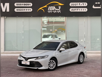 Toyota  Camry  LE  2019  Automatic  122,000 Km  4 Cylinder  Front Wheel Drive (FWD)  Sedan  White