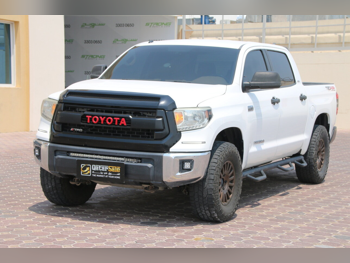 Toyota  Tundra  TRD  2014  Automatic  127,000 Km  8 Cylinder  Four Wheel Drive (4WD)  Pick Up  White