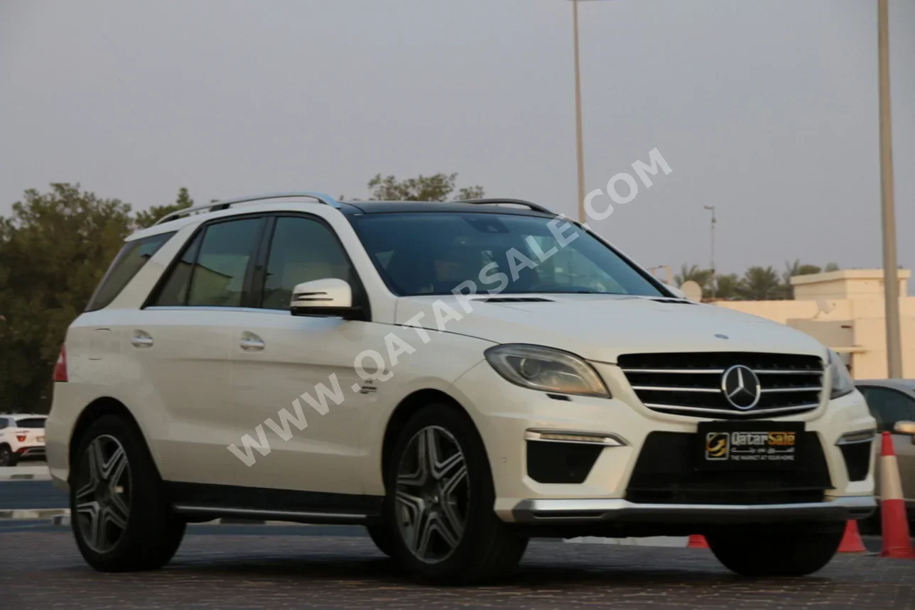 مرسيدس - بنز  ام ال  63 AMG  2013  اوتوماتيك  120,000 كم  8 سلندر  دفع رباعي  اس يو في  أبيض