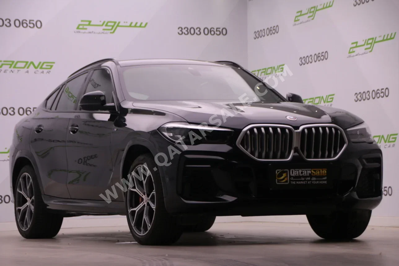 BMW  X-Series  X6  2023  Automatic  26,000 Km  6 Cylinder  Four Wheel Drive (4WD)  SUV  Black  With Warranty