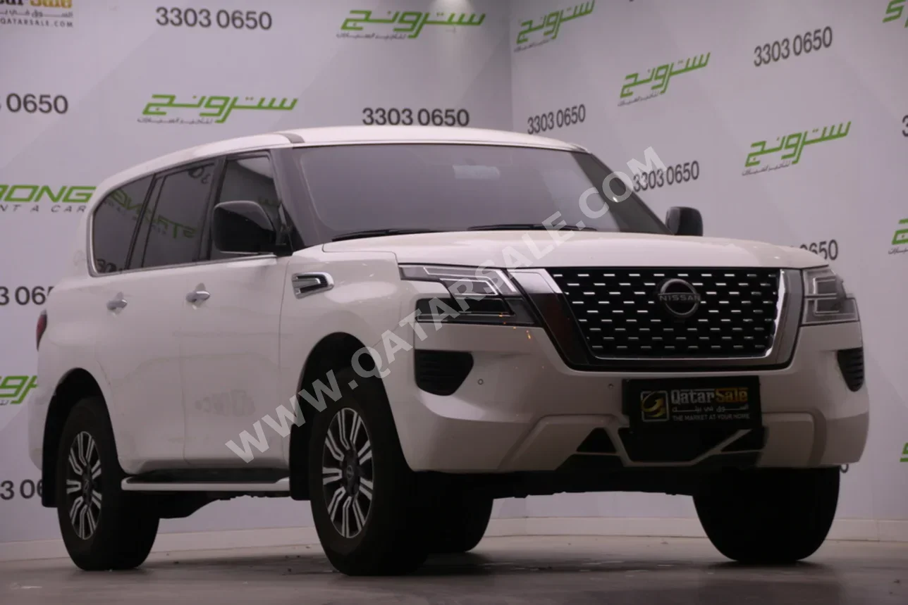 Nissan  Patrol  XE  2022  Automatic  70,000 Km  6 Cylinder  Four Wheel Drive (4WD)  SUV  White