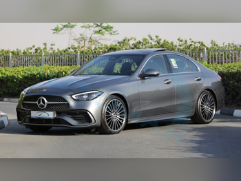 Mercedes-Benz  C-Class  200 AMG  2025  Automatic  15 Km  4 Cylinder  Rear Wheel Drive (RWD)  Sedan  Gray  With Warranty