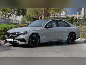 Mercedes-Benz  E-Class  300 AMG  2025  Automatic  12 Km  4 Cylinder  Rear Wheel Drive (RWD)  Sedan  Gray  With Warranty