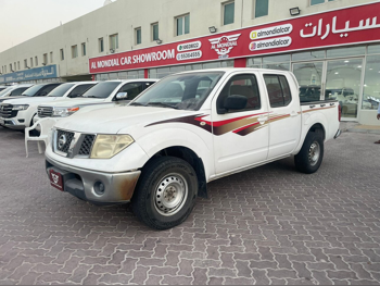 Nissan  Navara  SE  2012  Manual  254,000 Km  4 Cylinder  Four Wheel Drive (4WD)  Pick Up  White
