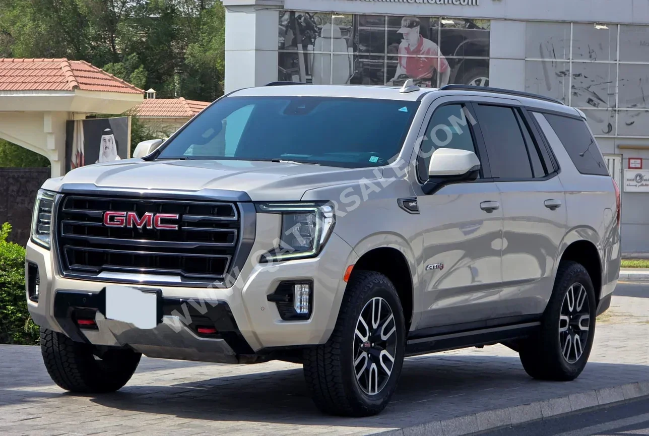 GMC  Yukon  AT 4  2023  Automatic  105,000 Km  8 Cylinder  Four Wheel Drive (4WD)  SUV  Gold  With Warranty