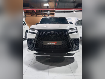 Lexus  LX  600 F Sport  2023  Automatic  59,000 Km  6 Cylinder  Four Wheel Drive (4WD)  SUV  White  With Warranty