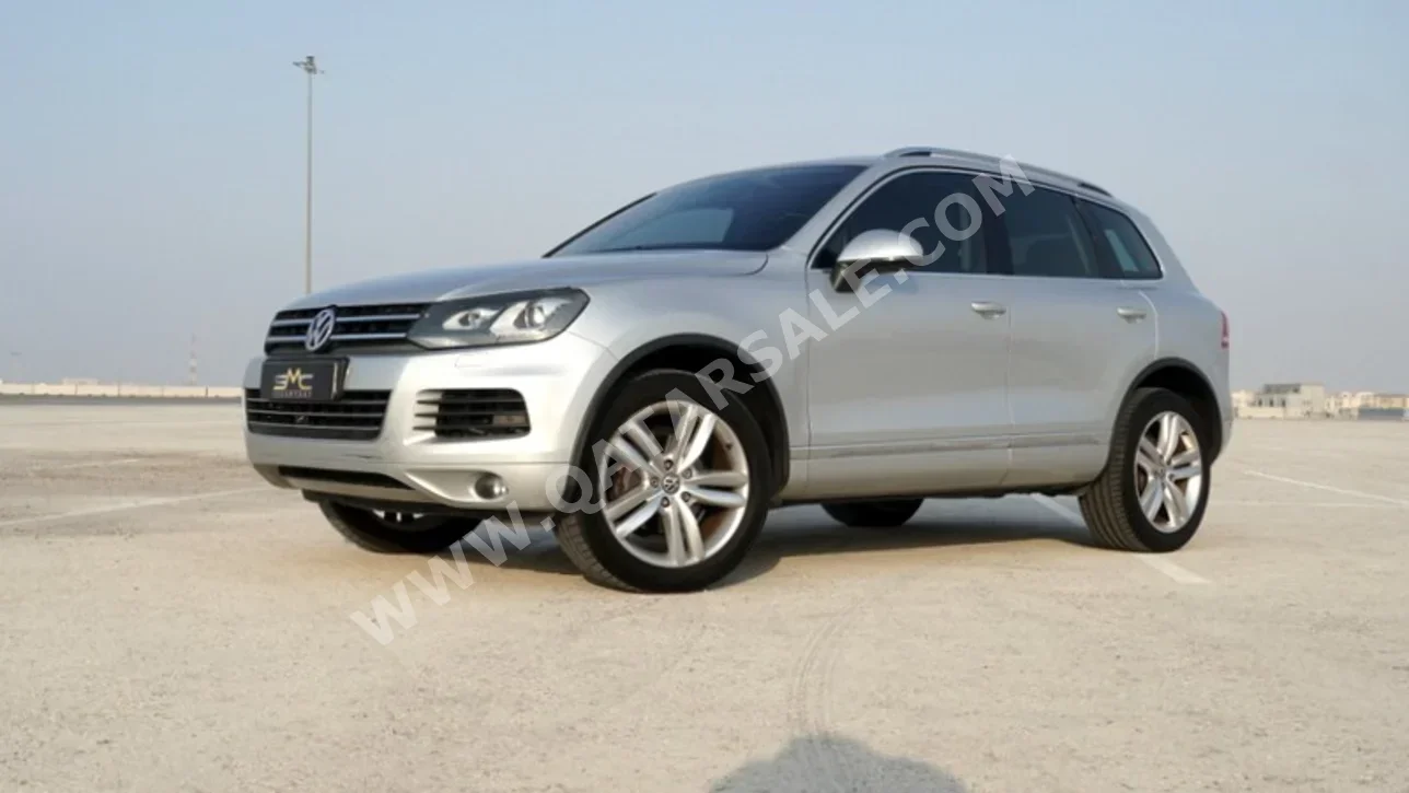 Volkswagen  Touareg  Sport  2013  Automatic  150,000 Km  6 Cylinder  All Wheel Drive (AWD)  SUV  Silver