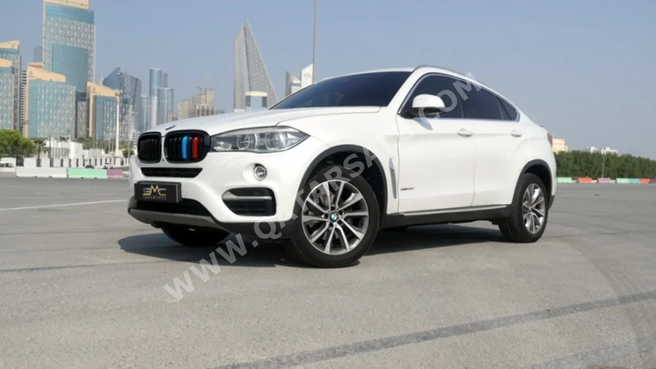 BMW  X-Series  X6  2015  Automatic  85,000 Km  6 Cylinder  Four Wheel Drive (4WD)  SUV  White