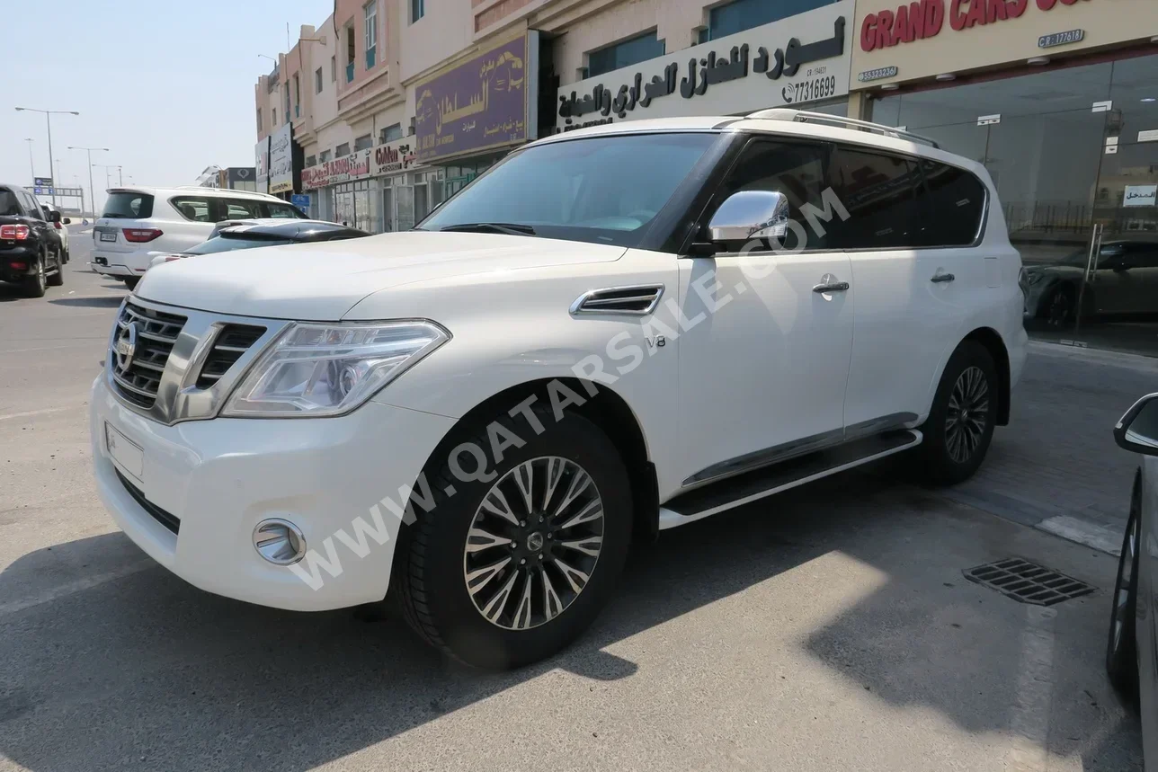 نيسان  باترول  ال اي  2013  اوتوماتيك  232,000 كم  8 سلندر  دفع رباعي  اس يو في  أبيض