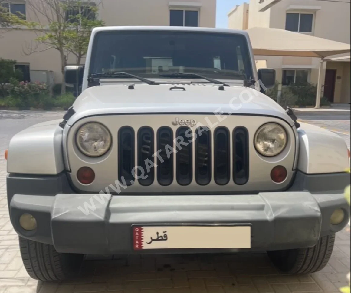 Jeep  Wrangler  Sahara  2009  Automatic  210,610 Km  6 Cylinder  Four Wheel Drive (4WD)  SUV  Silver and Black