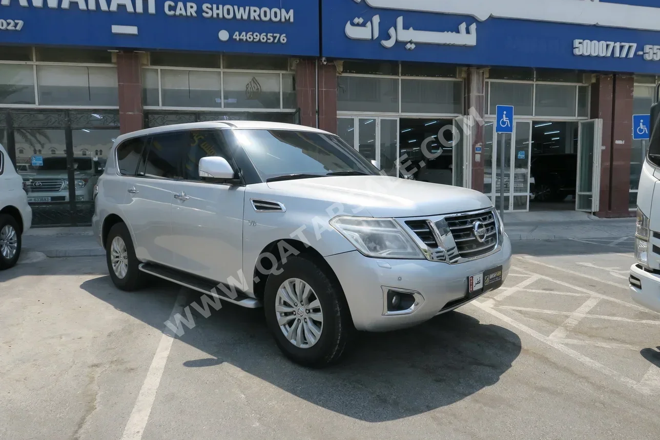 Nissan  Patrol  SE  2014  Automatic  184,000 Km  8 Cylinder  Four Wheel Drive (4WD)  SUV  Silver