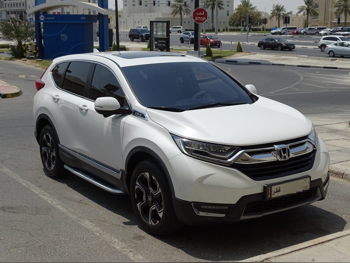 Honda  CRV  Touring  2019  Automatic  65,000 Km  4 Cylinder  Four Wheel Drive (4WD)  SUV  White