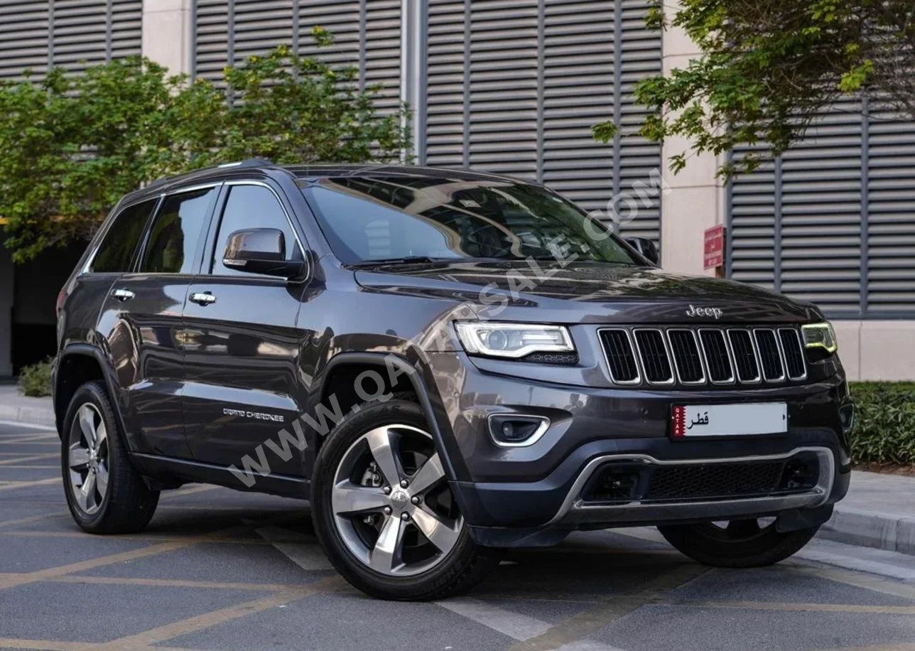Jeep  Grand Cherokee  Limited  2014  Automatic  60,000 Km  8 Cylinder  Four Wheel Drive (4WD)  SUV  Gray