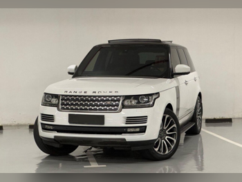 Land Rover  Range Rover  Vogue SE Super charged  2015  Automatic  86,000 Km  8 Cylinder  Four Wheel Drive (4WD)  SUV  White