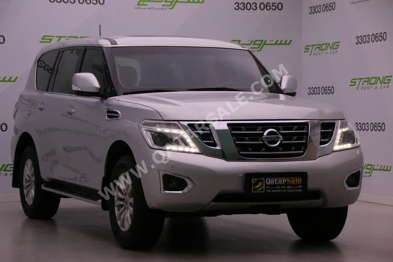Nissan  Patrol  SE  2015  Automatic  240,000 Km  8 Cylinder  Four Wheel Drive (4WD)  SUV  Silver