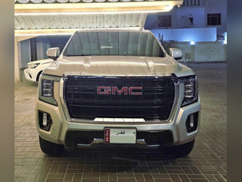 GMC  Yukon  SLE  2021  Automatic  106,100 Km  8 Cylinder  Rear Wheel Drive (RWD)  SUV  Gold