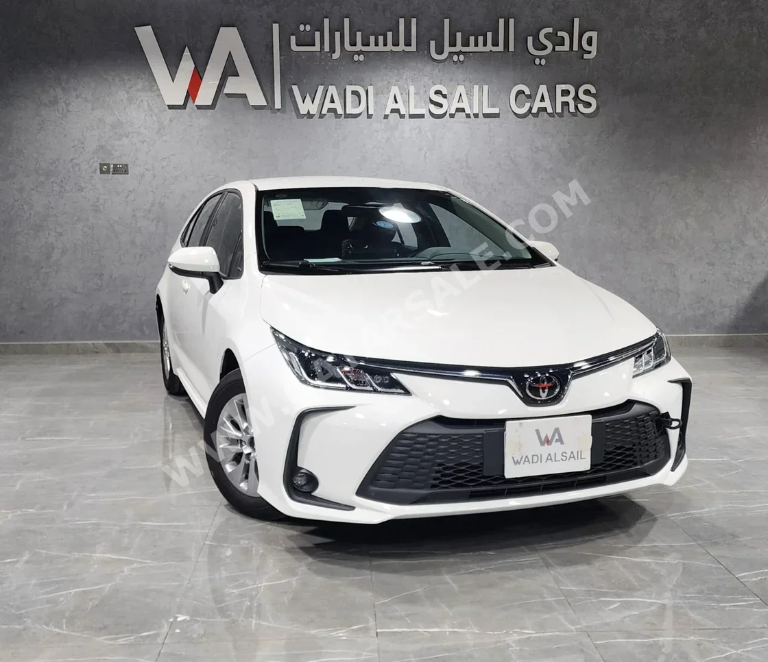 Toyota  Corolla  2025  Automatic  0 Km  4 Cylinder  Front Wheel Drive (FWD)  Sedan  White  With Warranty