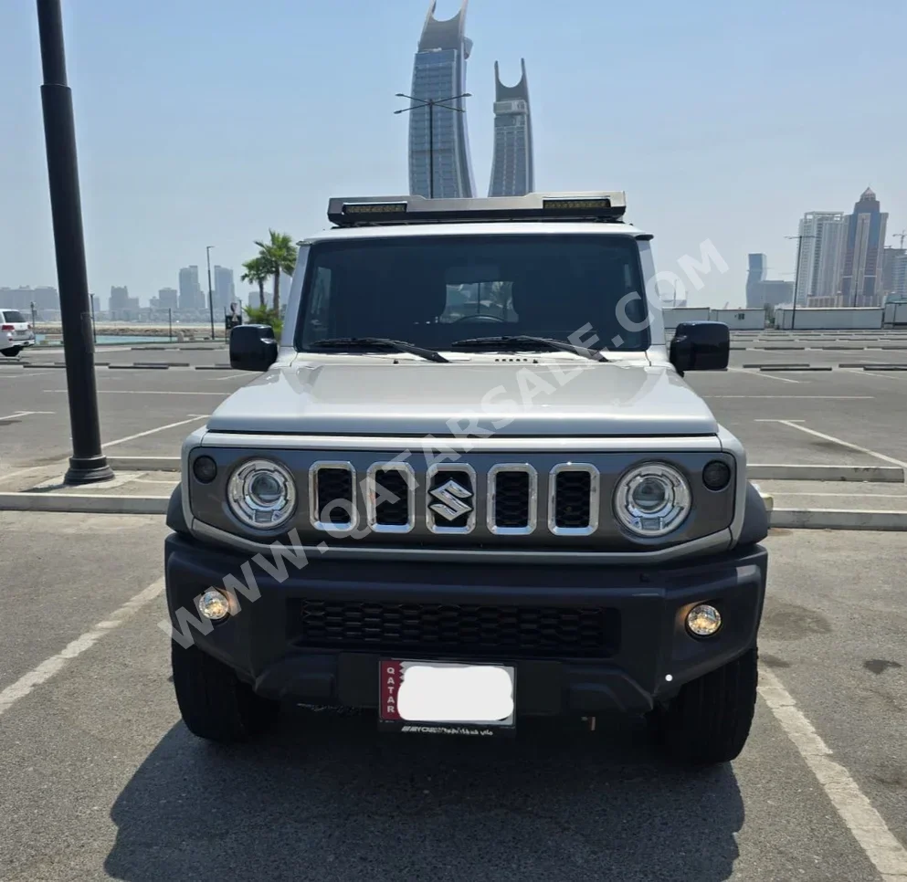 Suzuki  Jimny  GLX  2024  Automatic  16,500 Km  4 Cylinder  Four Wheel Drive (4WD)  SUV  Silver  With Warranty