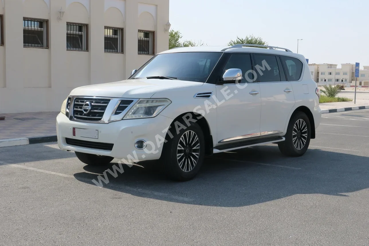 Nissan  Patrol  Platinum  2016  Automatic  284,000 Km  8 Cylinder  Four Wheel Drive (4WD)  SUV  White