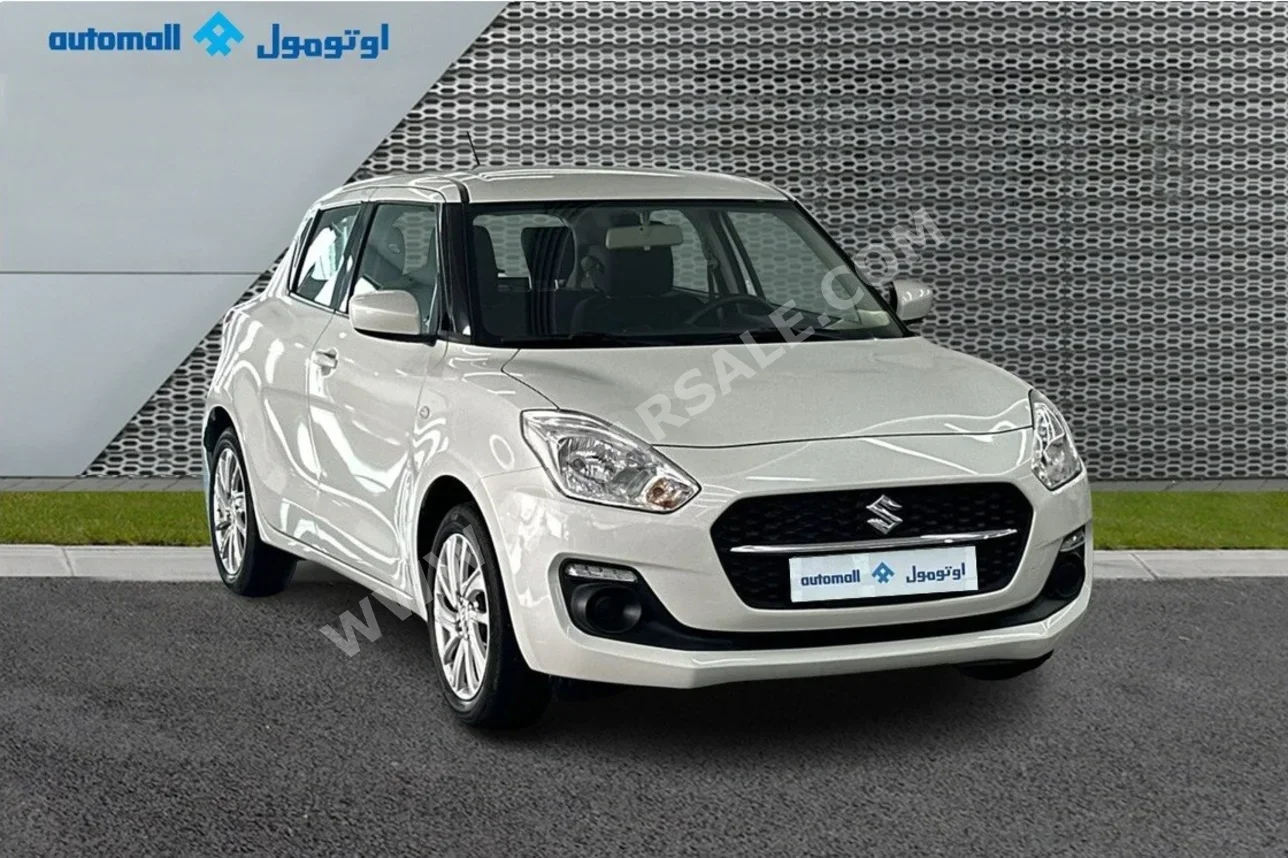 Suzuki  Swift  2024  Automatic  32,071 Km  4 Cylinder  Front Wheel Drive (FWD)  Hatchback  White  With Warranty