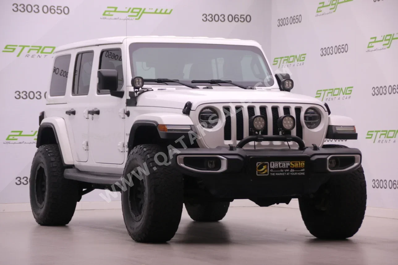 Jeep  Wrangler  Sahara  2018  Automatic  59,000 Km  6 Cylinder  Four Wheel Drive (4WD)  SUV  White