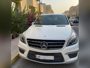 Mercedes-Benz  ML  63 AMG  2013  Automatic  101,050 Km  8 Cylinder  All Wheel Drive (AWD)  SUV  White