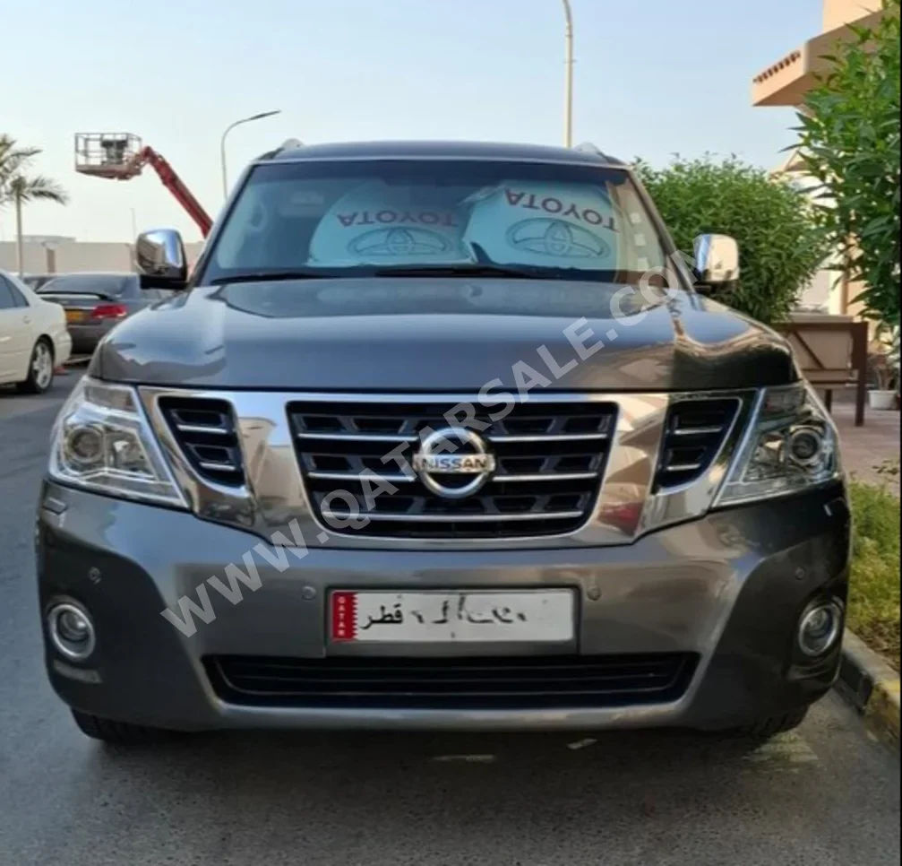 Nissan  Patrol  Platinum  2014  Automatic  177,000 Km  8 Cylinder  Four Wheel Drive (4WD)  SUV  Dark Gray