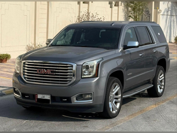 GMC  Yukon  SLT  2019  Automatic  124,000 Km  8 Cylinder  Four Wheel Drive (4WD)  SUV  Gray