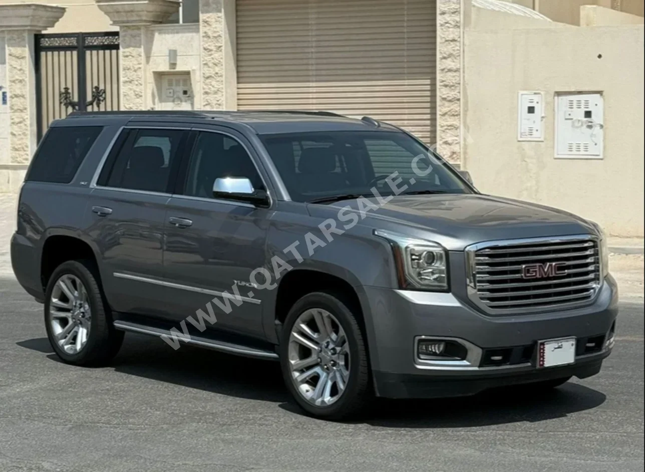 جي ام سي  يوكون  اس ال تي  2019  اوتوماتيك  124,000 كم  8 سلندر  دفع رباعي  اس يو في  رمادي
