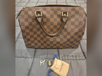 Bags  - Louis Vuitton  - Brown  - Genuine Leather  - For Women
