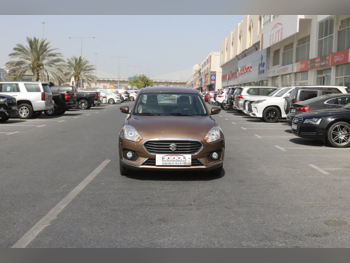 Suzuki  D zire  4 Cylinder  Sedan  Brown  2018