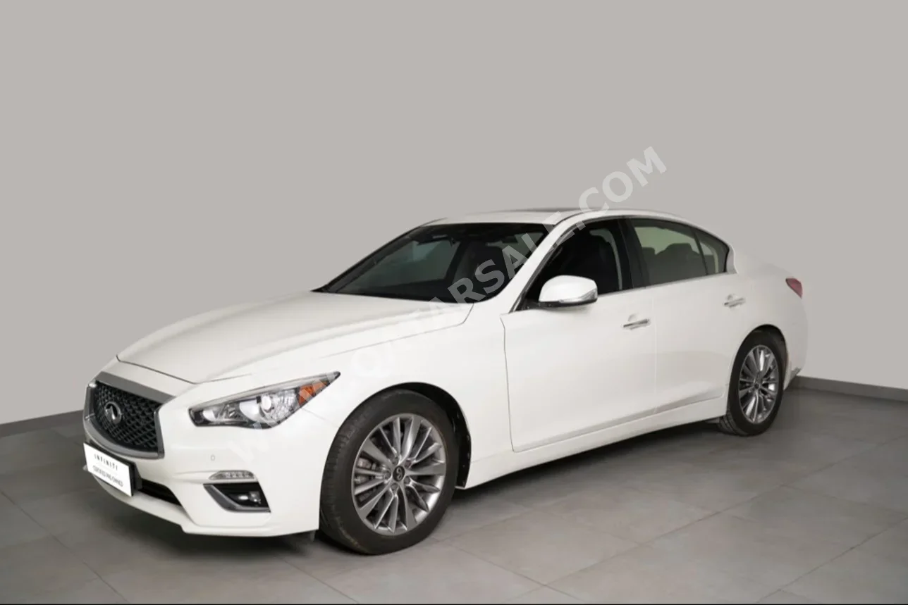 Infiniti  Q  50  2024  Automatic  13,370 Km  4 Cylinder  Rear Wheel Drive (RWD)  Sedan  White  With Warranty