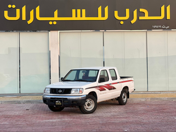 Nissan  Pickup  2005  Manual  20,000 Km  4 Cylinder  Rear Wheel Drive (RWD)  Pick Up  White