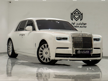 Rolls-Royce  Phantom  2018  Automatic  63,000 Km  12 Cylinder  All Wheel Drive (AWD)  Sedan  White and Black