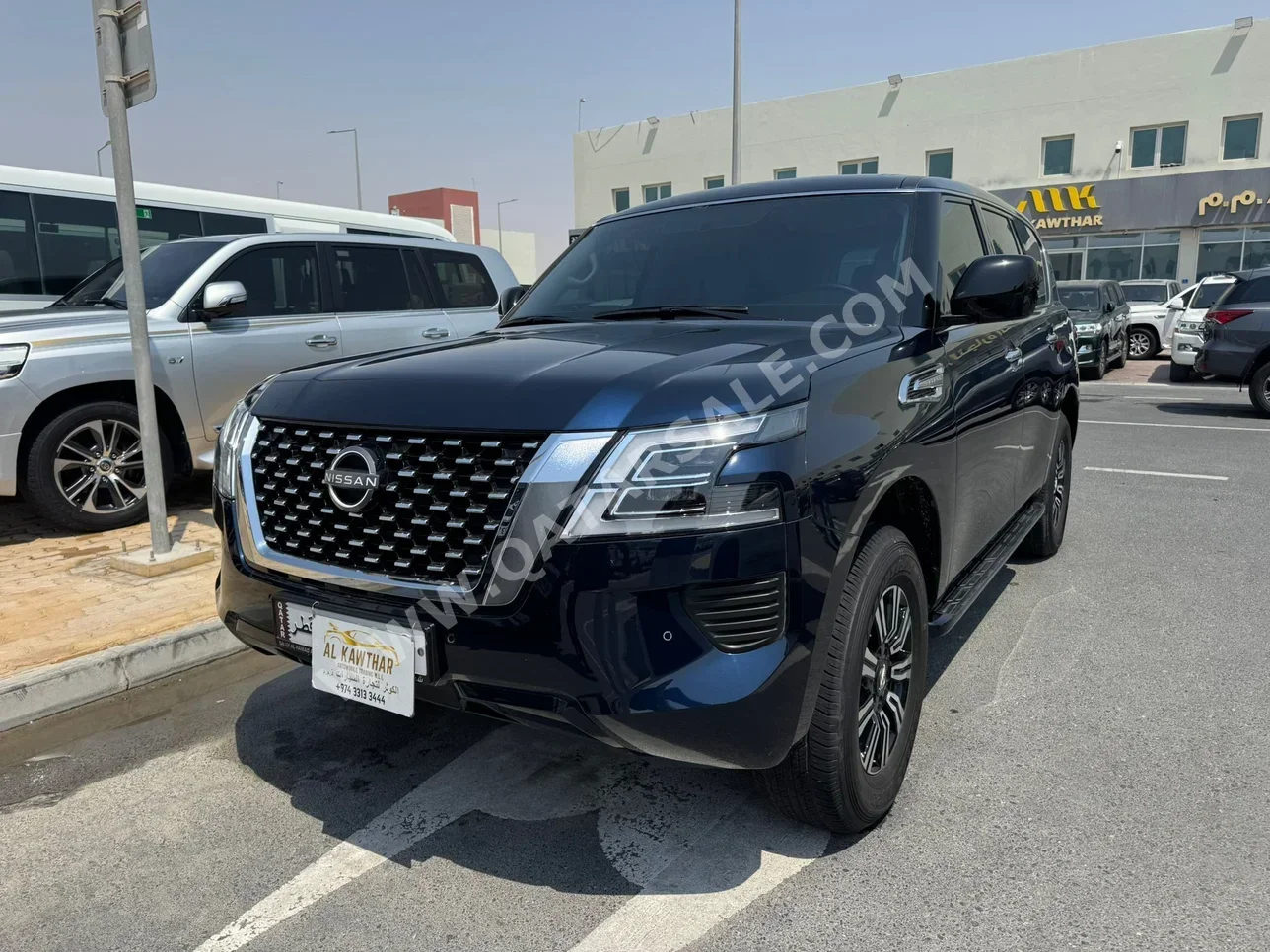Nissan  Patrol  XE  2024  Automatic  23,000 Km  6 Cylinder  Four Wheel Drive (4WD)  SUV  Dark Blue  With Warranty