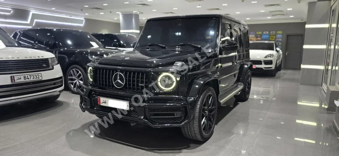 مرسيدس - بنز  جي - كلاس  63 اي ام جي  2021  اوتوماتيك  100,000 كم  8 سلندر  دفع رباعي  اس يو في  أسود