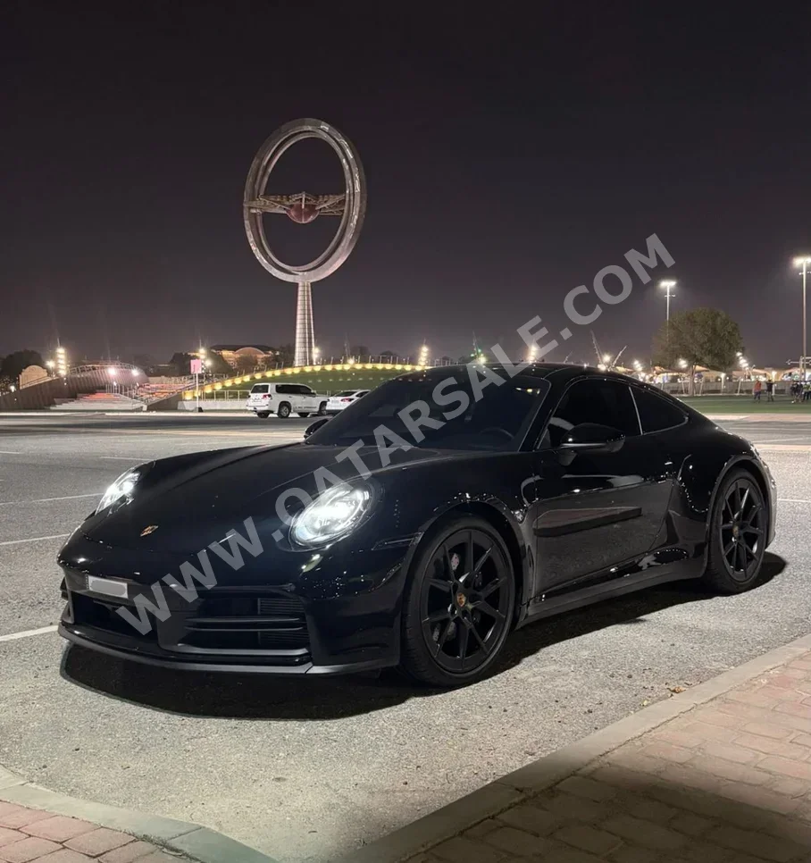 Porsche  911  Carrera  2025  Automatic  6,000 Km  6 Cylinder  Rear Wheel Drive (RWD)  Coupe / Sport  Black  With Warranty