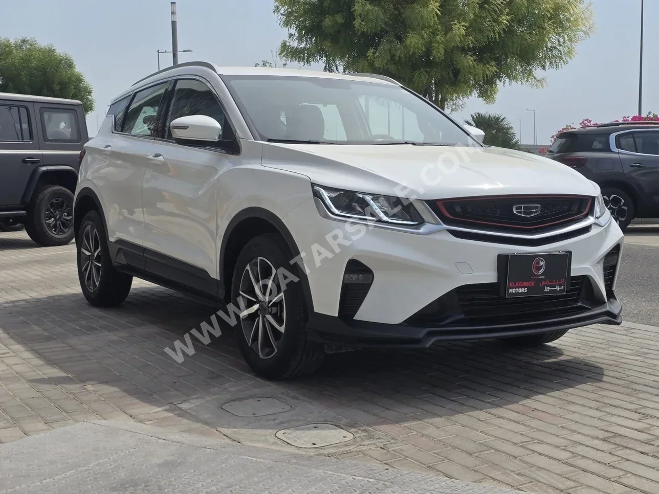 Geely  Coolray  2023  Automatic  28,000 Km  4 Cylinder  Front Wheel Drive (FWD)  SUV  White  With Warranty