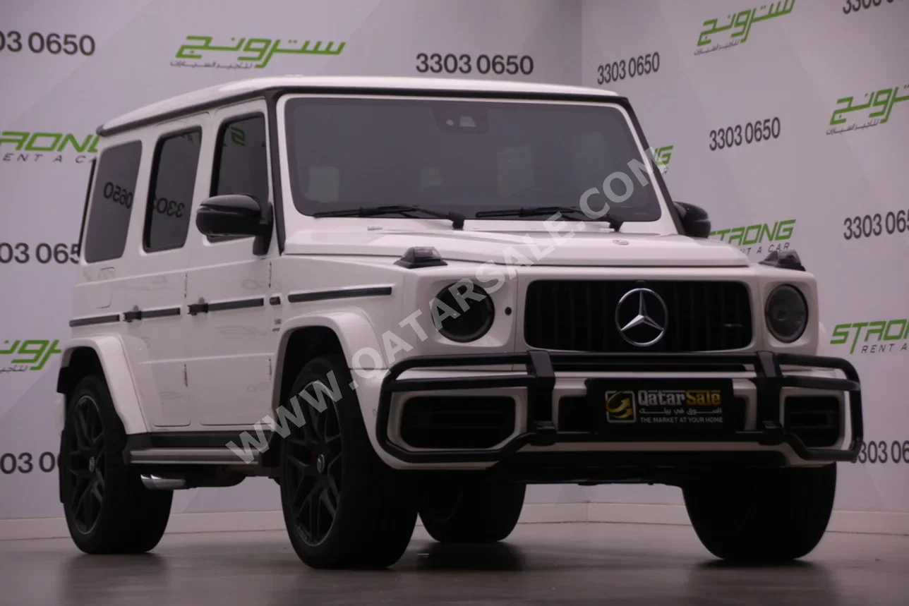 مرسيدس - بنز  جي - كلاس  63 اي ام جي  2021  اوتوماتيك  89,000 كم  8 سلندر  دفع رباعي  اس يو في  أبيض