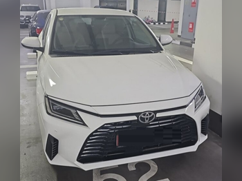 Toyota  Yaris  2023  Automatic  87,000 Km  4 Cylinder  Front Wheel Drive (FWD)  Sedan  White  With Warranty