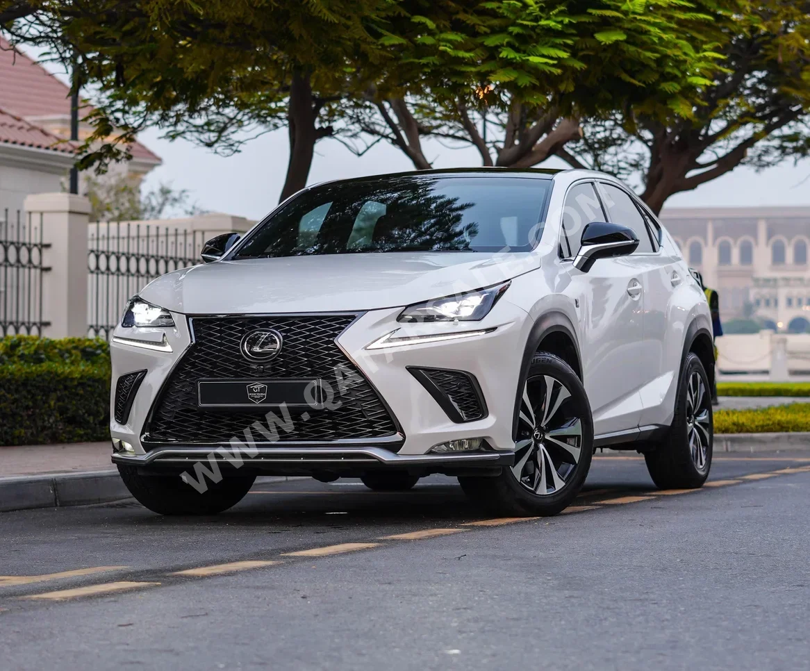 Lexus  NX  300  2019  Automatic  48,000 Km  4 Cylinder  All Wheel Drive (AWD)  SUV  White  With Warranty