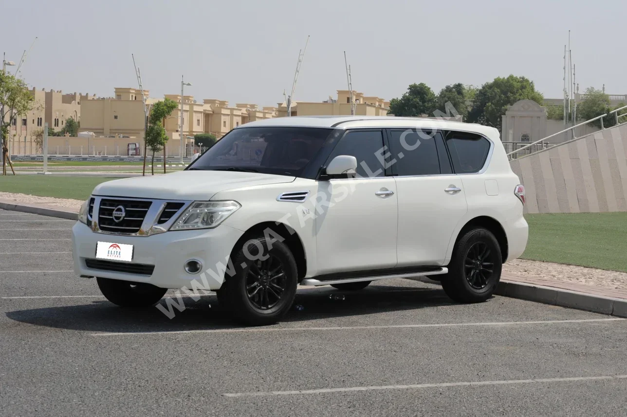 Nissan  Patrol  SE  2013  Automatic  253,000 Km  8 Cylinder  Four Wheel Drive (4WD)  SUV  White