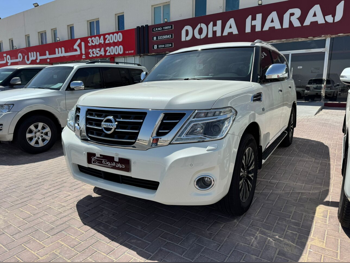 Nissan  Patrol  Platinum  2014  Automatic  447,000 Km  8 Cylinder  Four Wheel Drive (4WD)  SUV  White