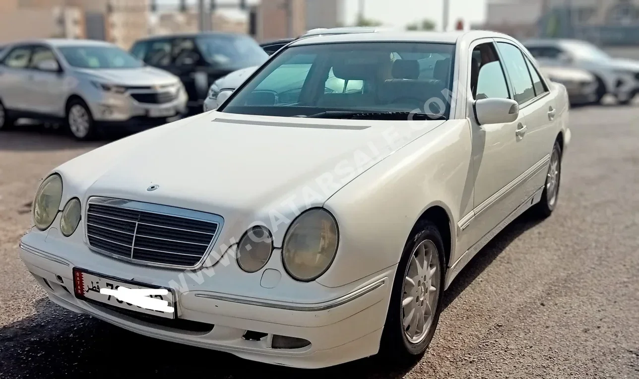 Mercedes-Benz  E-Class  240  2001  Automatic  197,000 Km  6 Cylinder  Rear Wheel Drive (RWD)  Sedan  White